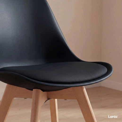 Cadeira de jantar Leda com assento estofado e design moderno - Preto Produto Cadeira de jantar Leda com assento estofado e design moderno - Preto